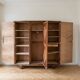 Vintage 1950s wardrobe in wood with a rosewood effect.