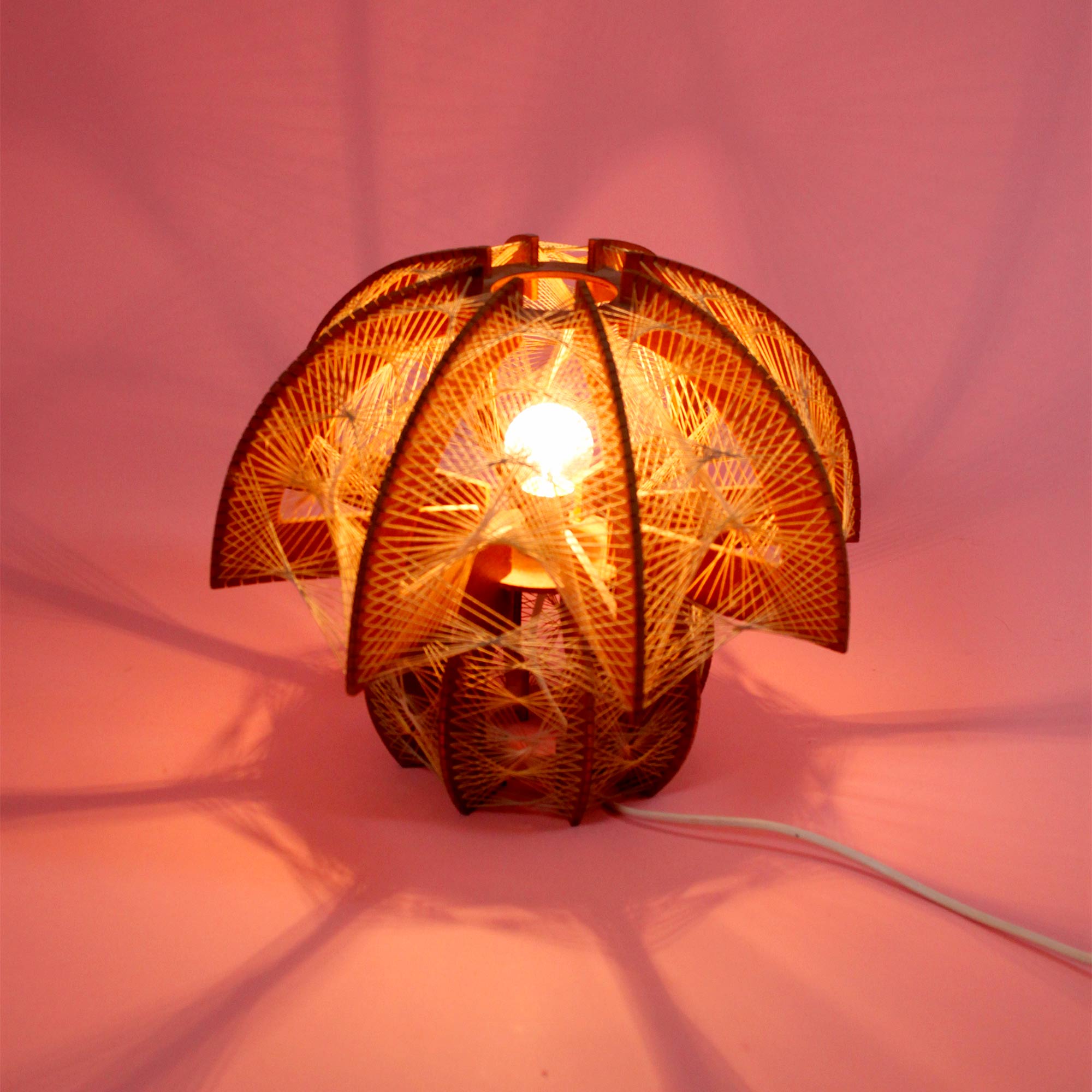 Scandinavian wood and yarn lamp