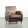 Comfortable sheepskin armchair with matching piping and a timeless look