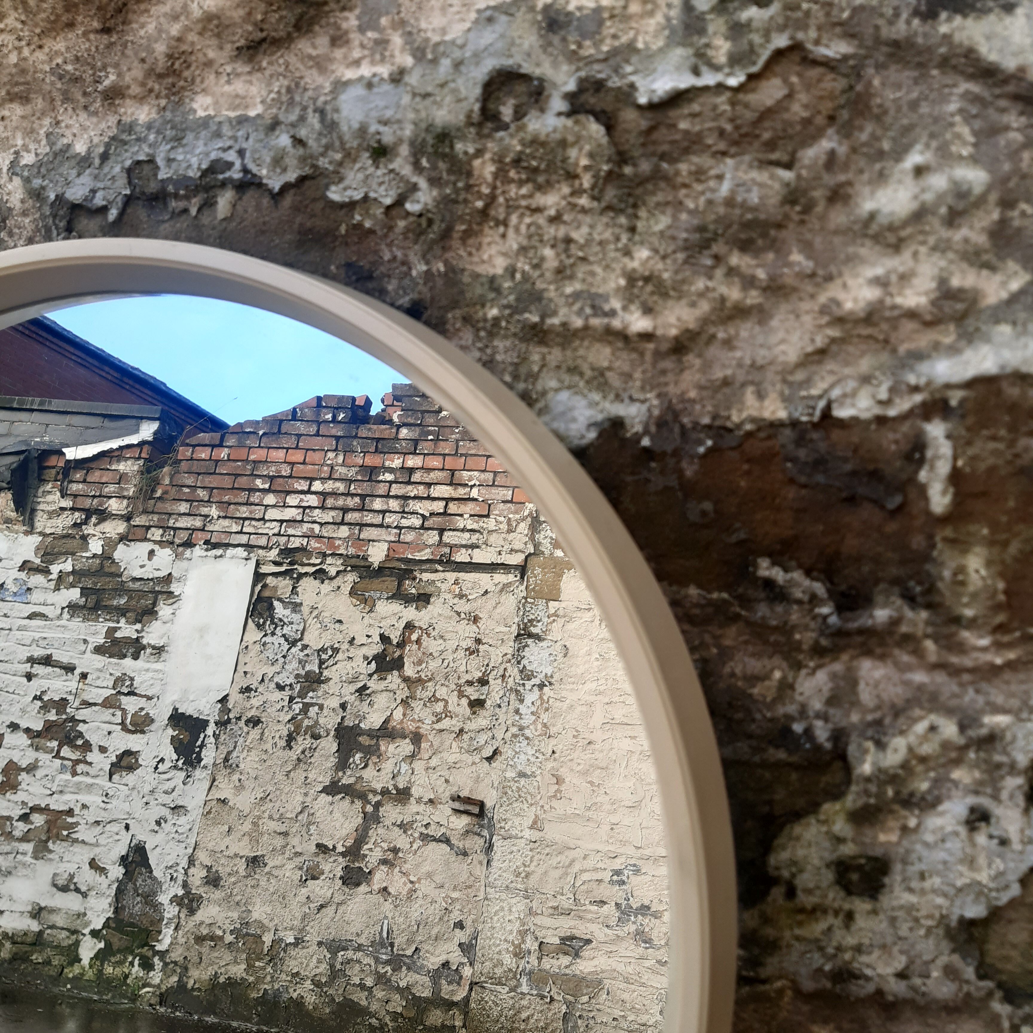 Mid century circular white mirror