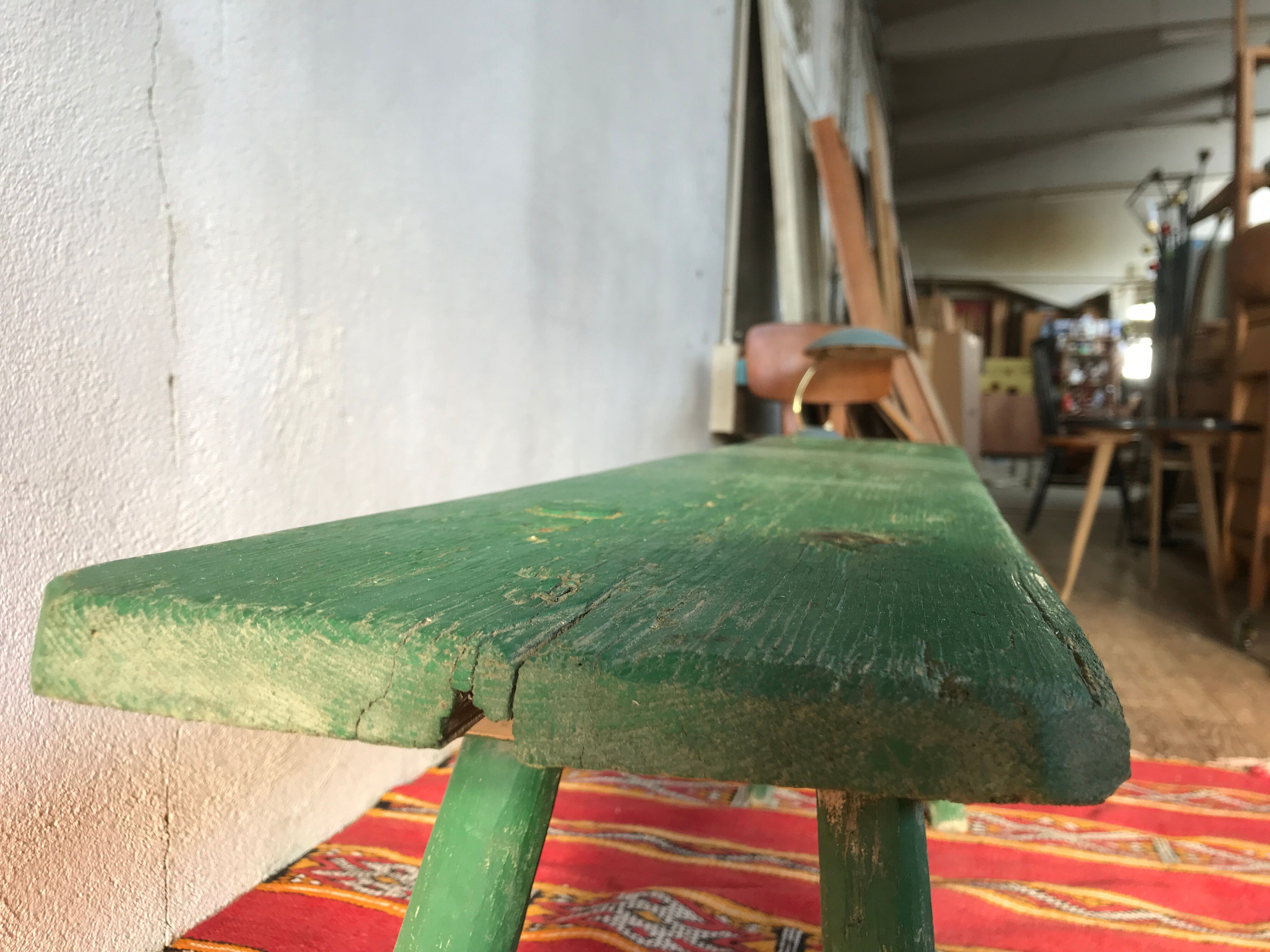 Old vintage bench in green patina fir