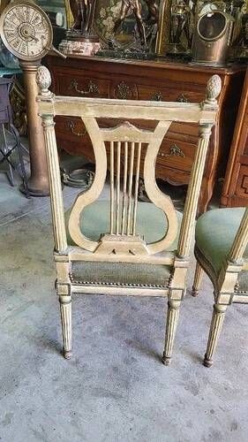 Pair of Louis XVI style chairs from the 18th century with lyre back.