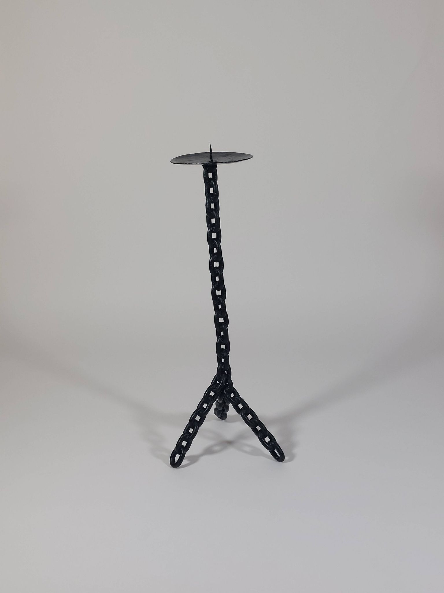 Vintage black brutalist chain floor candlestick