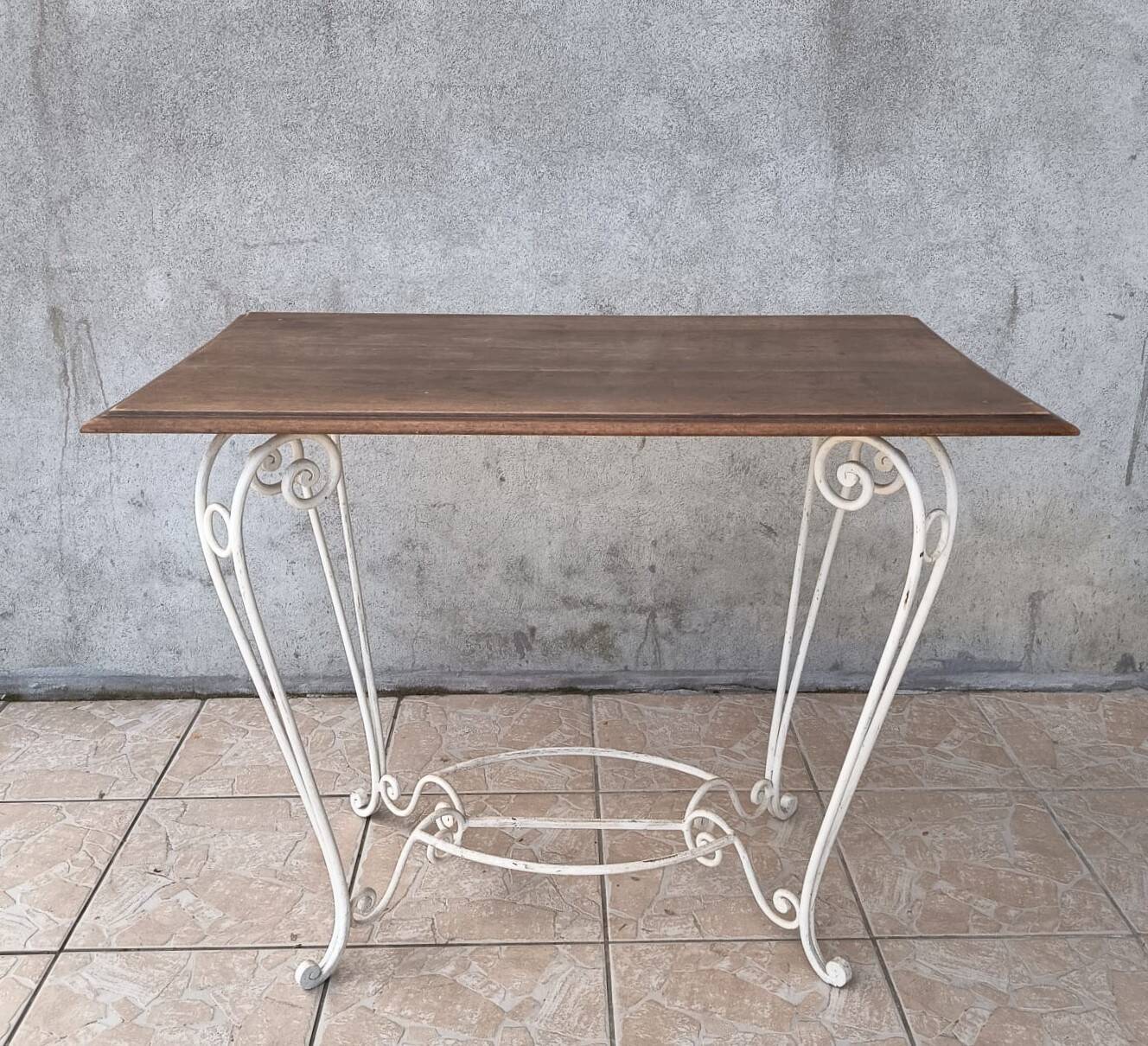 Old wrought iron and walnut table