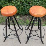 Pair of vintage metal and leather bar stools