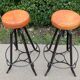 Pair of vintage metal and leather bar stools
