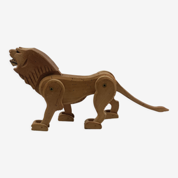 Articulated wooden lion