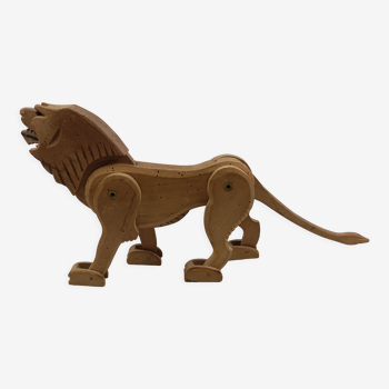 Lion articulé en bois