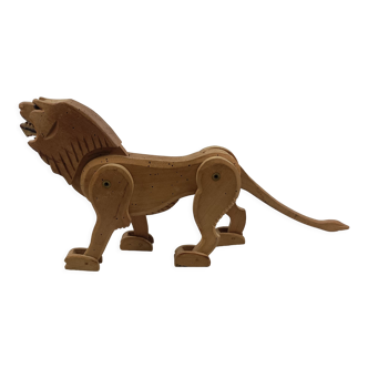Articulated wooden lion