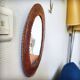 Leather repoussé mirror, Sri Lanka, 1960s