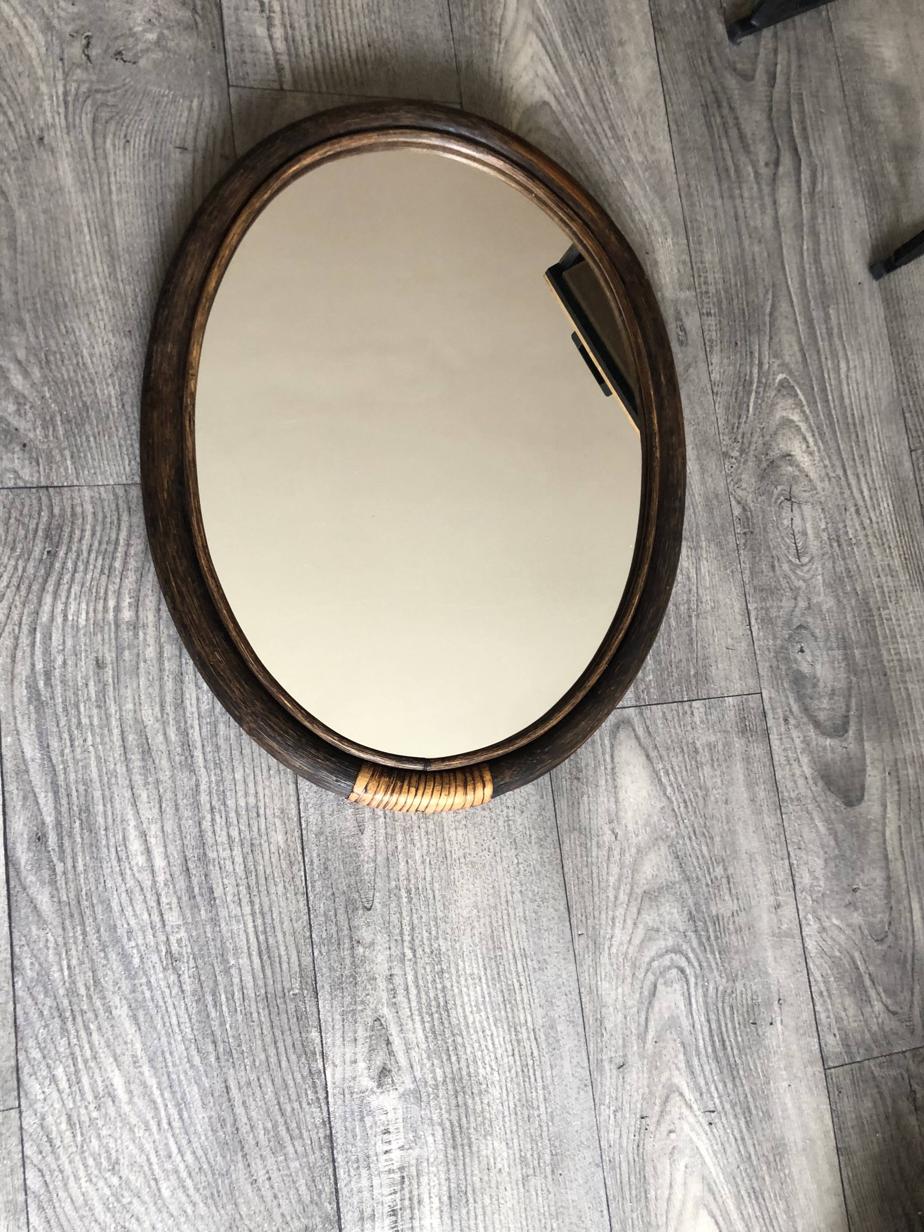 Oval rattan mirror