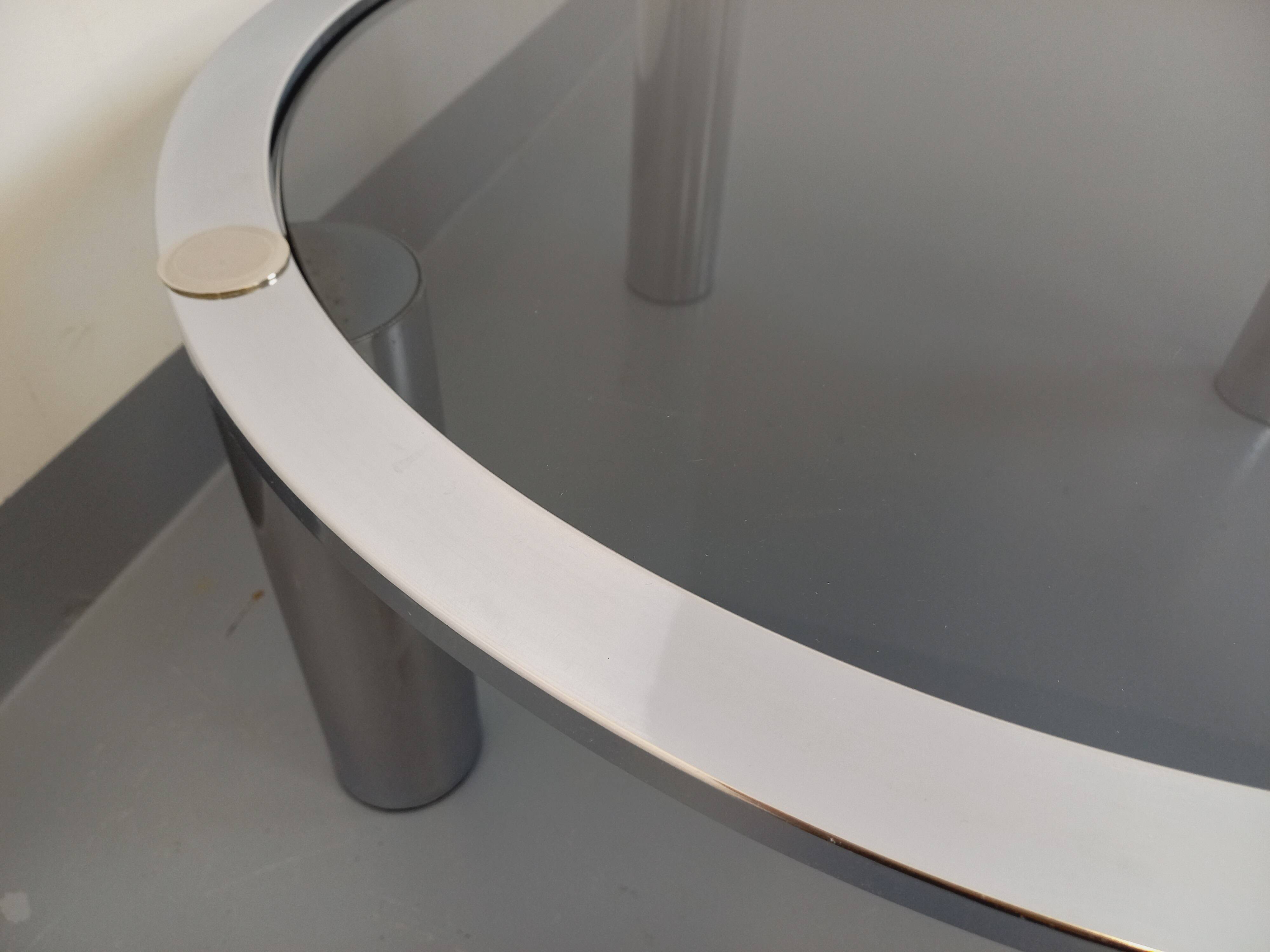 Vintage round coffee table in smoked glass and chrome metal from the 70s