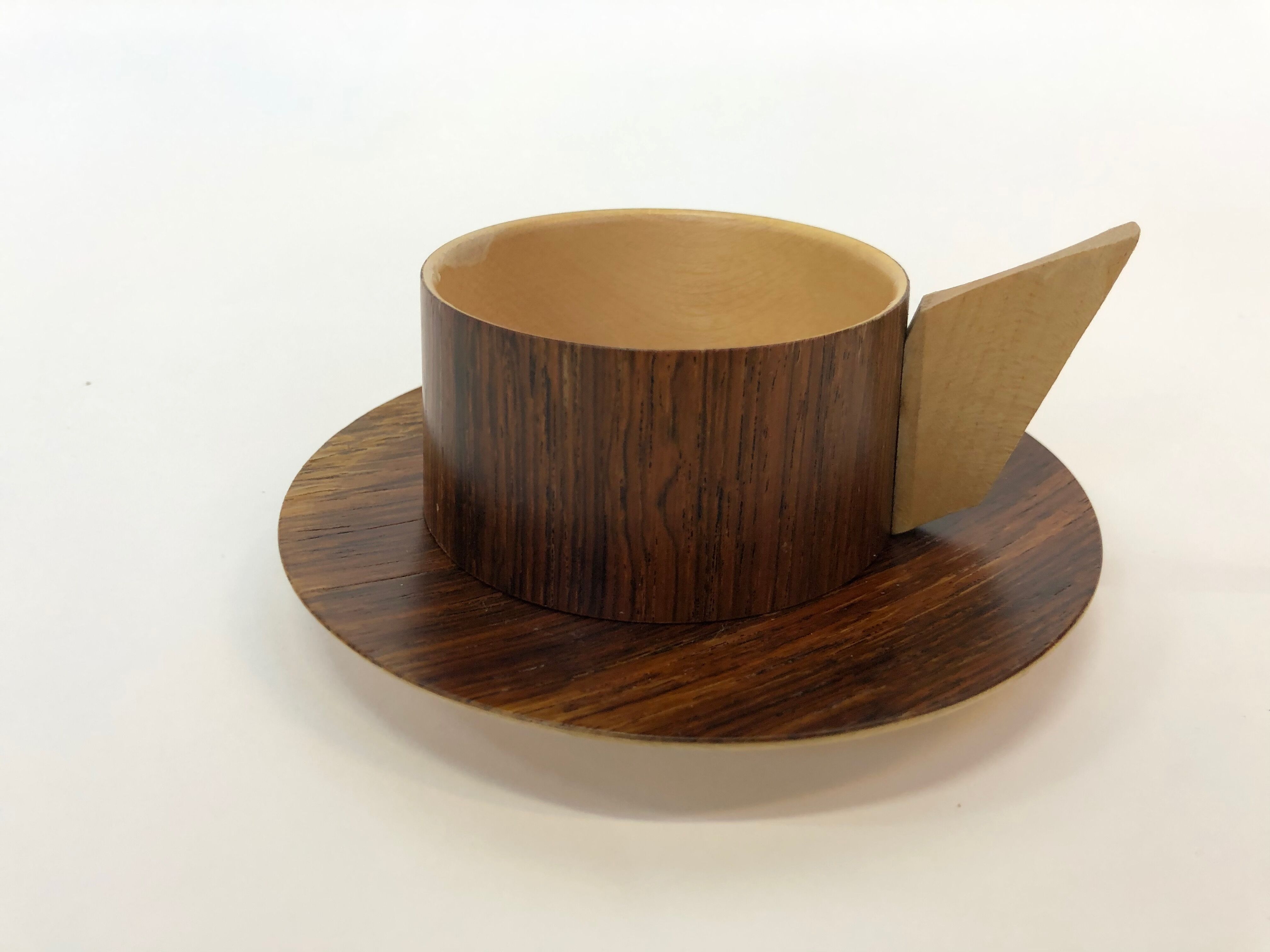 Vintage wooden cups and saucers in teak