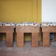 Set of 3 beech wood stools with fabric upholstery in the style of Miro.