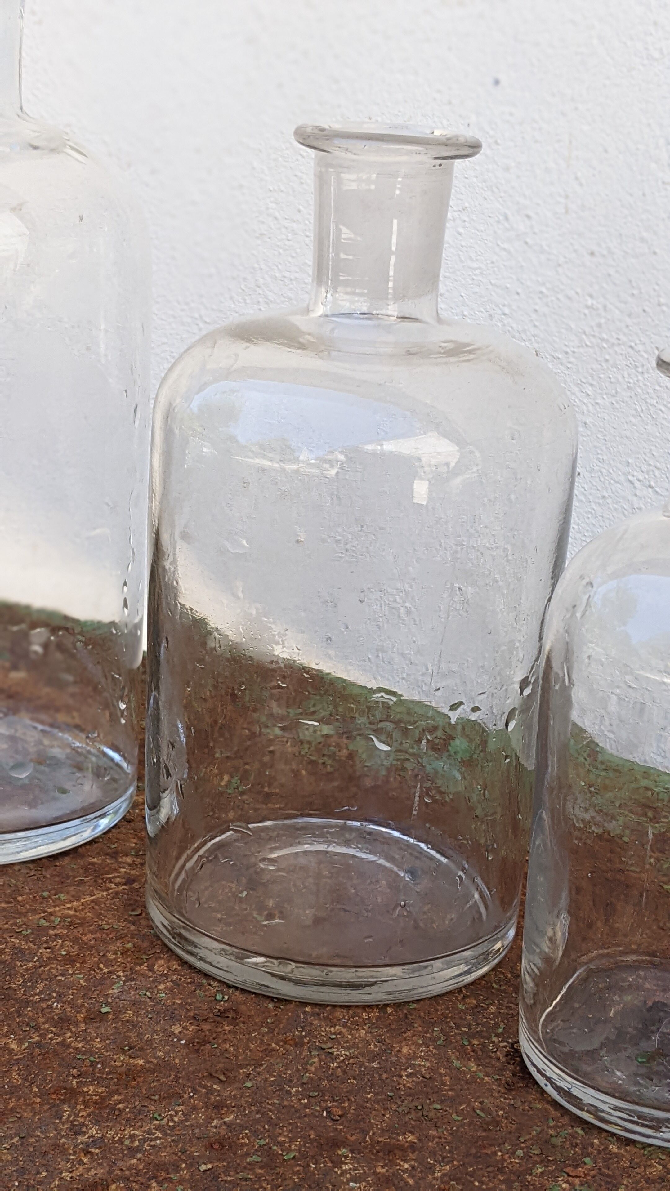 Series of 4 old bottles of herbalist