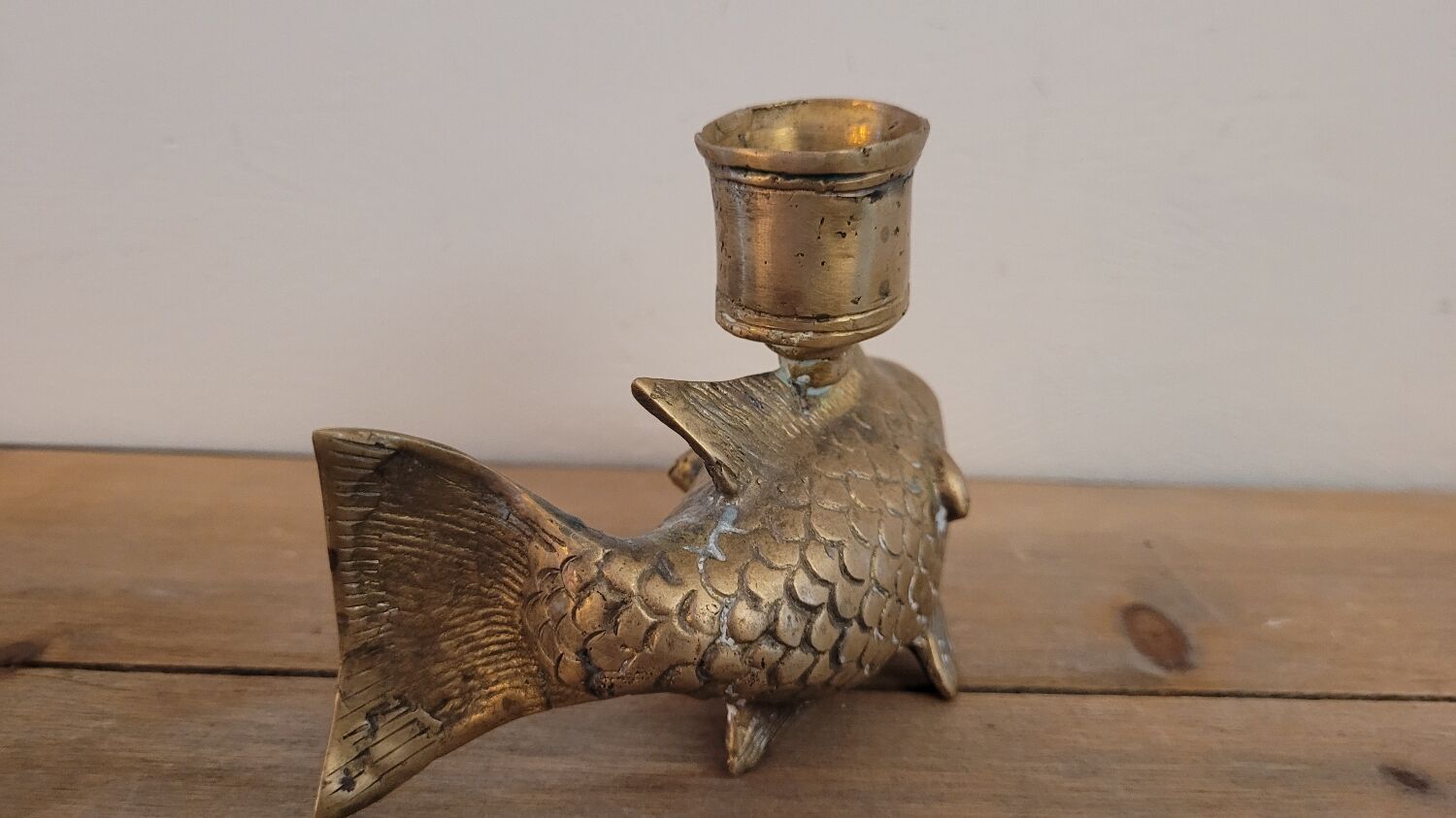 Yellow copper fish candle holder