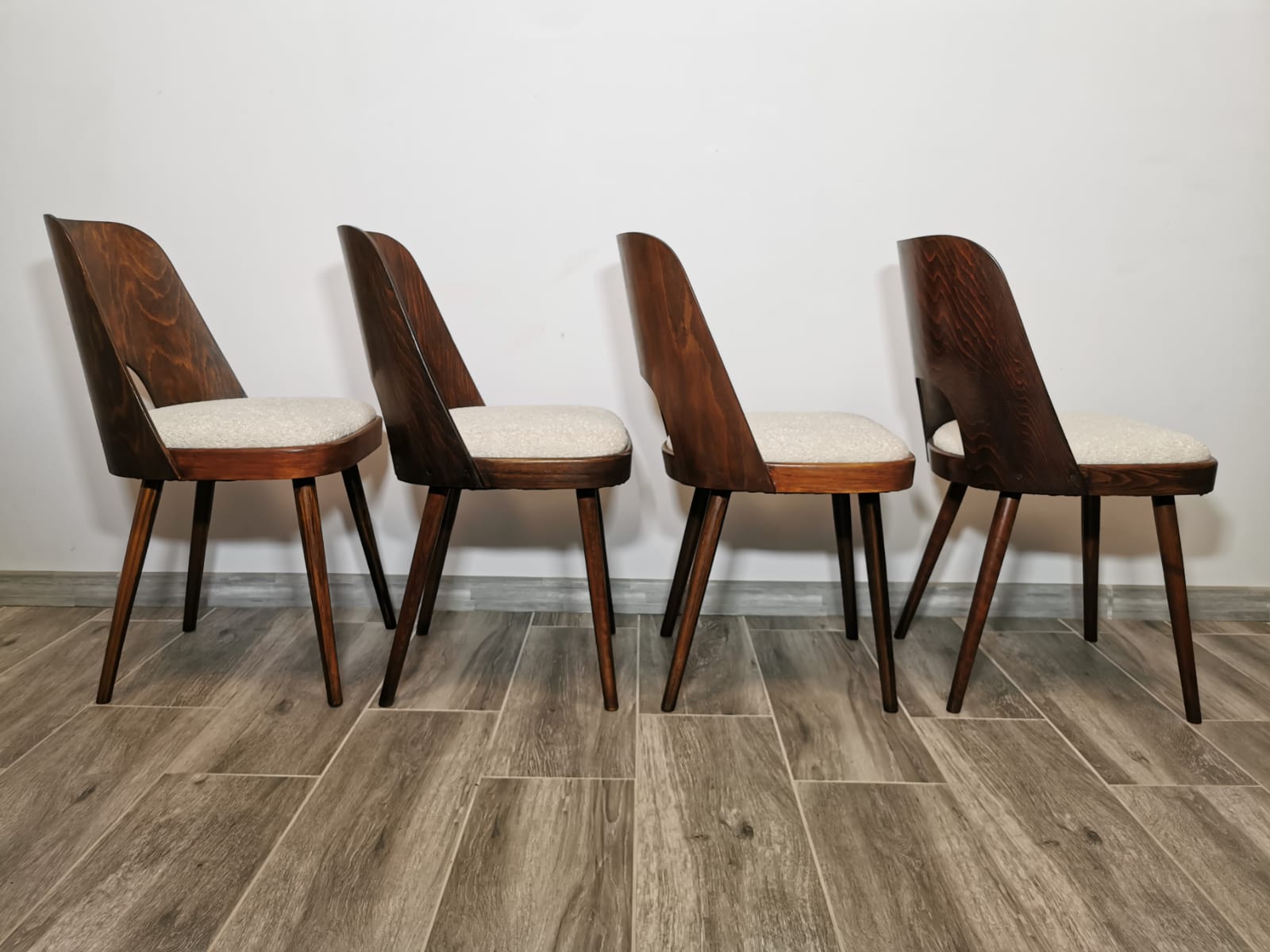 Dining chairs by Oswald Haerdtl