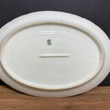 Oval-shaped dish in Limoges porcelain decorated with barbels Louis XV style