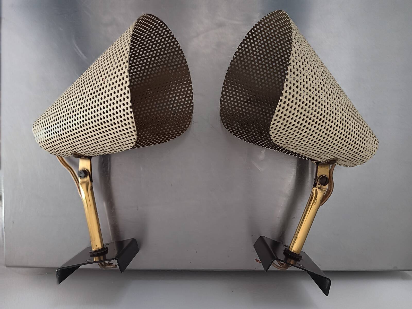 Pair of perforated metal horn wall lights