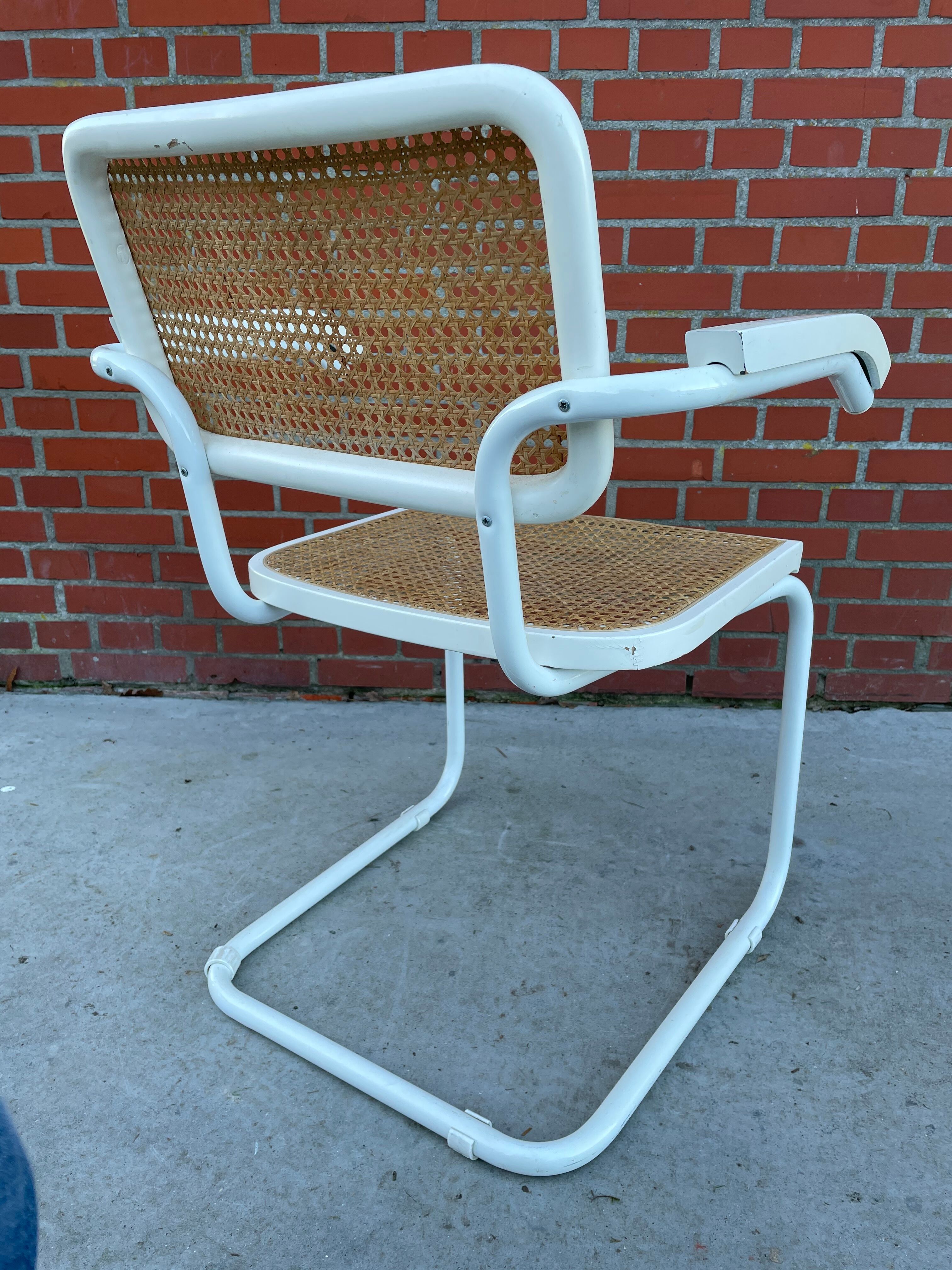 Cesca Chair model with armrest in white