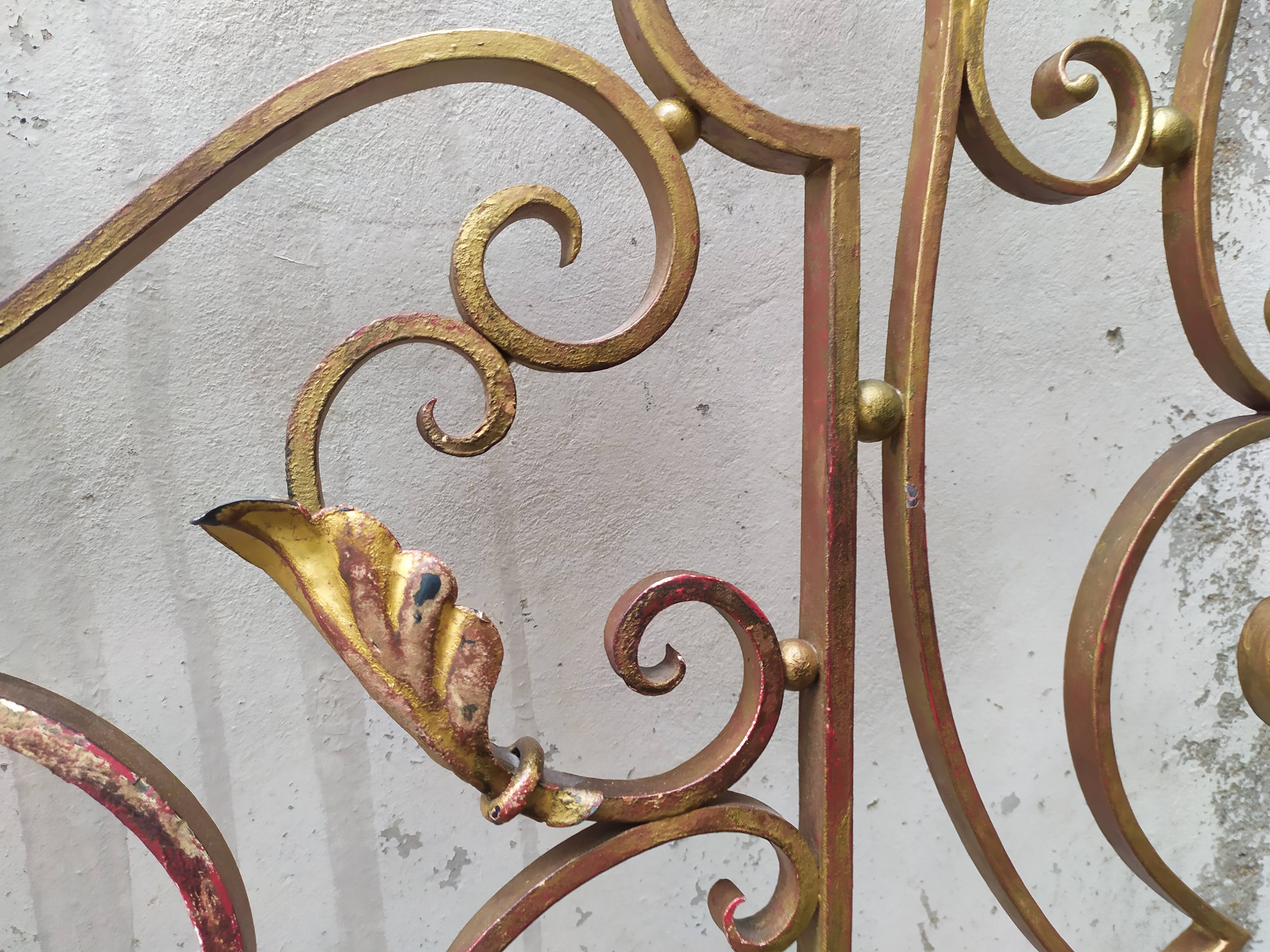 Golden wrought iron bedhead