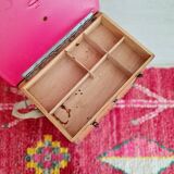 Old fisherman's stool with red seat