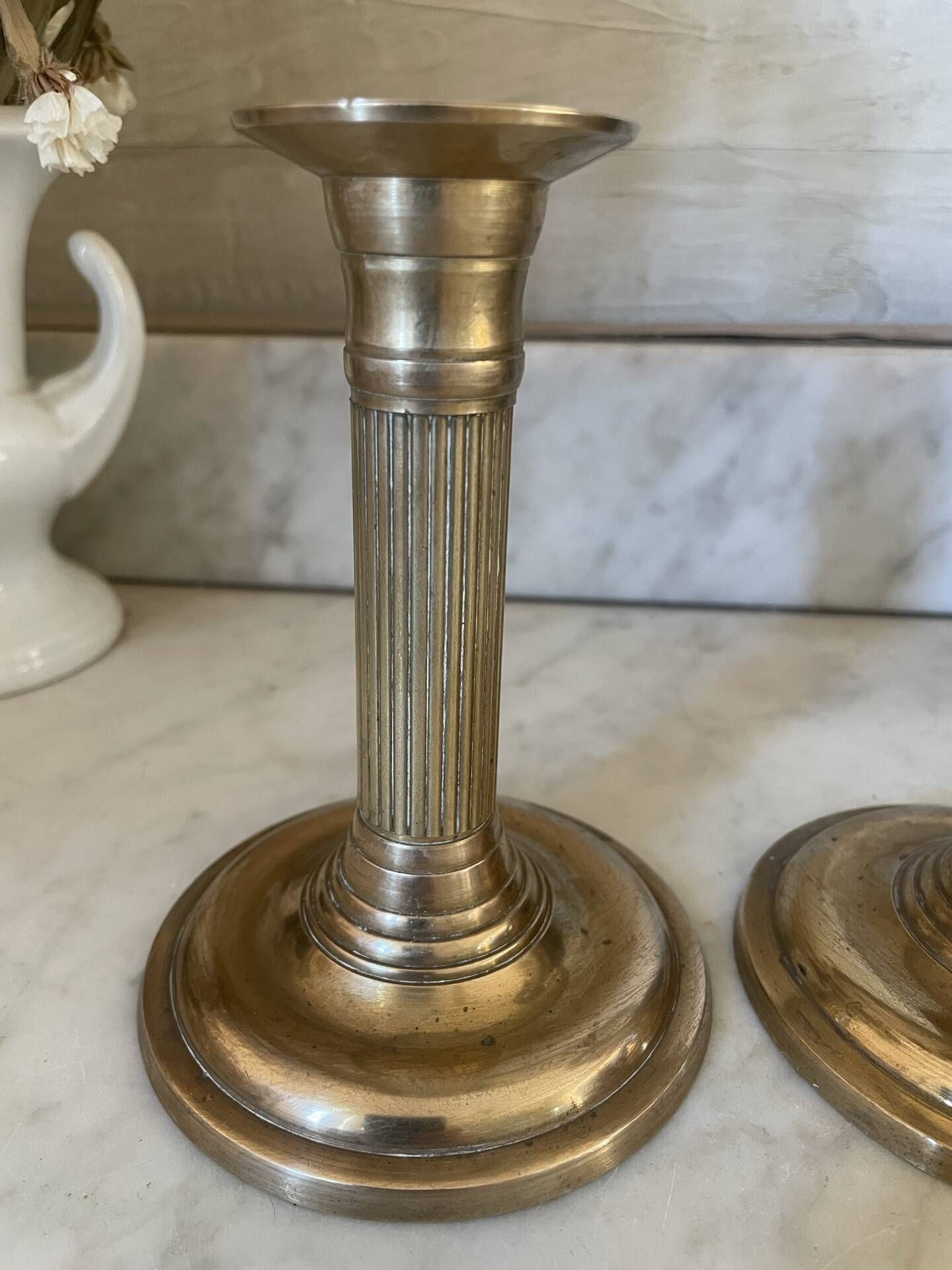 Pair of fluted column candlesticks in brass