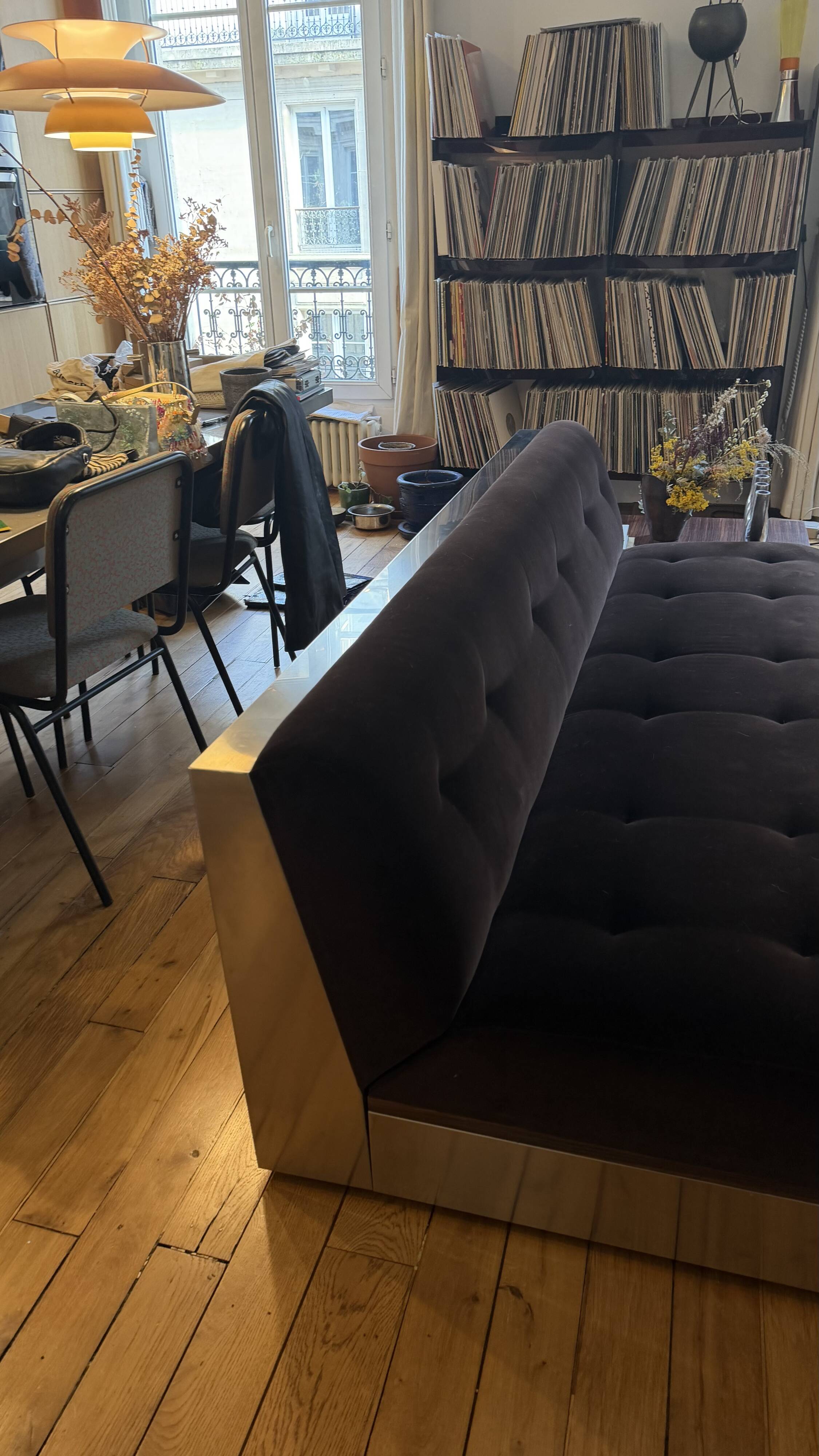 Red Edition Stanley 3-seater sofa with matching chocolate velvet storage.