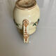Old ceramic jug with floral decoration