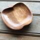 Empty wooden apple pocket