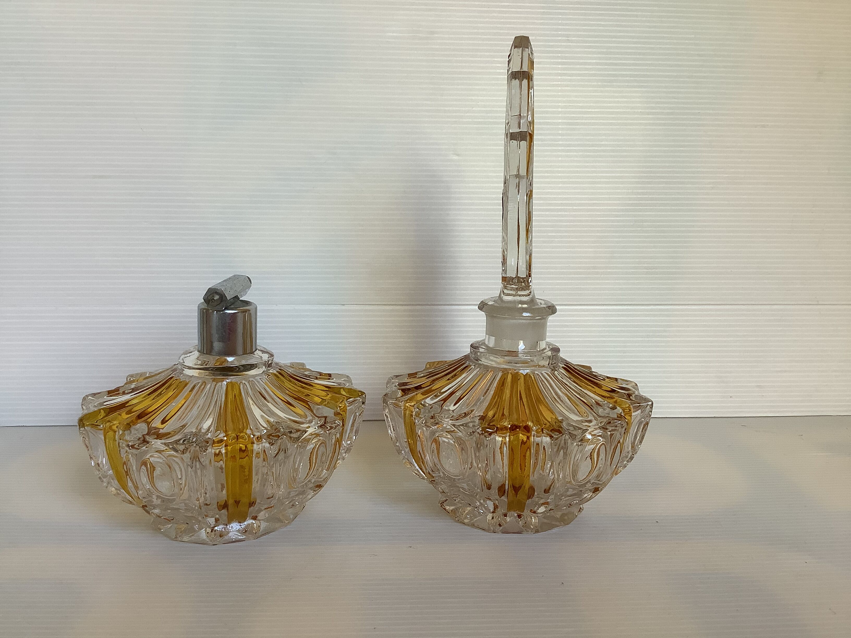 Perfume bottles and art deco spray
