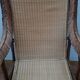 Old rattan armchair circa 1900-1930