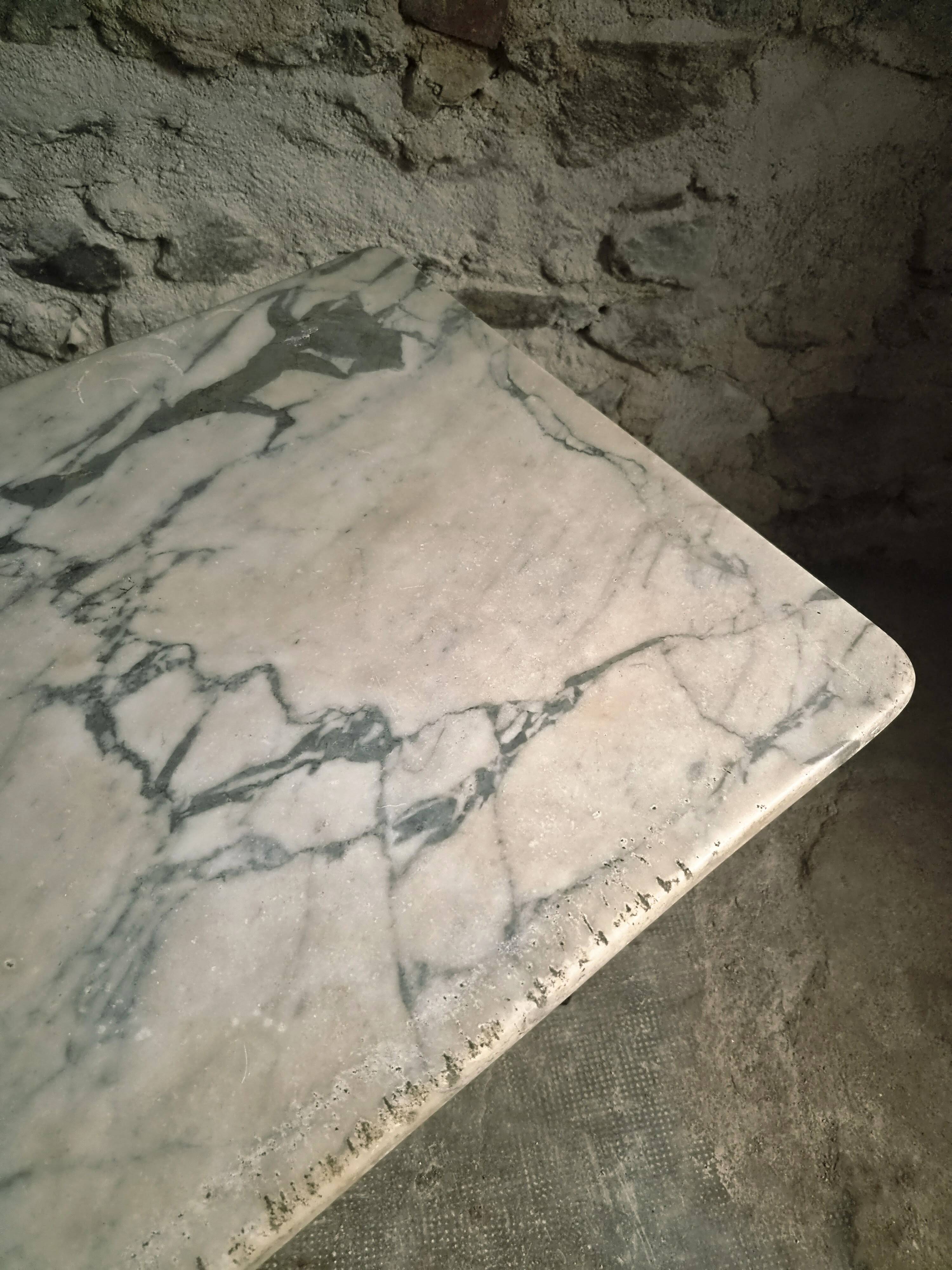 French bistro table made of marble with a cast iron base, 1920s–1930s.