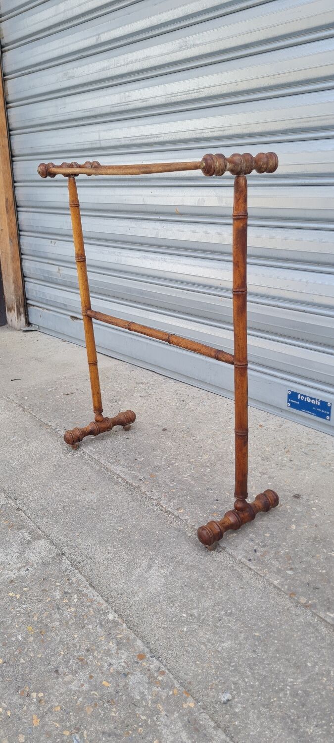 Turned wooden towel rack