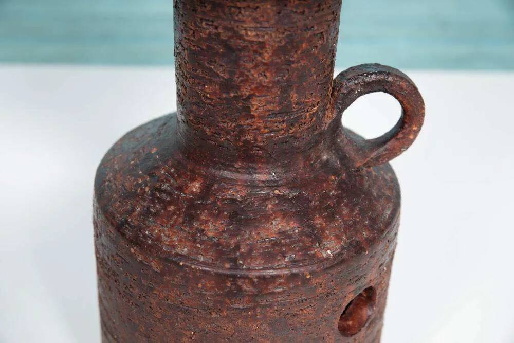 Vintage ceramic table lamp with a space age or bold look, fat lava ceramic from the 1960s.