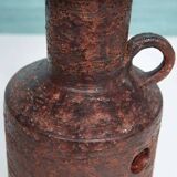 Vintage ceramic table lamp with a space age or bold look, fat lava ceramic from the 1960s.