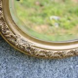 Bevelled oval antique mirror