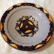 Hollow glazed terracotta dish with oriental decor to hang
