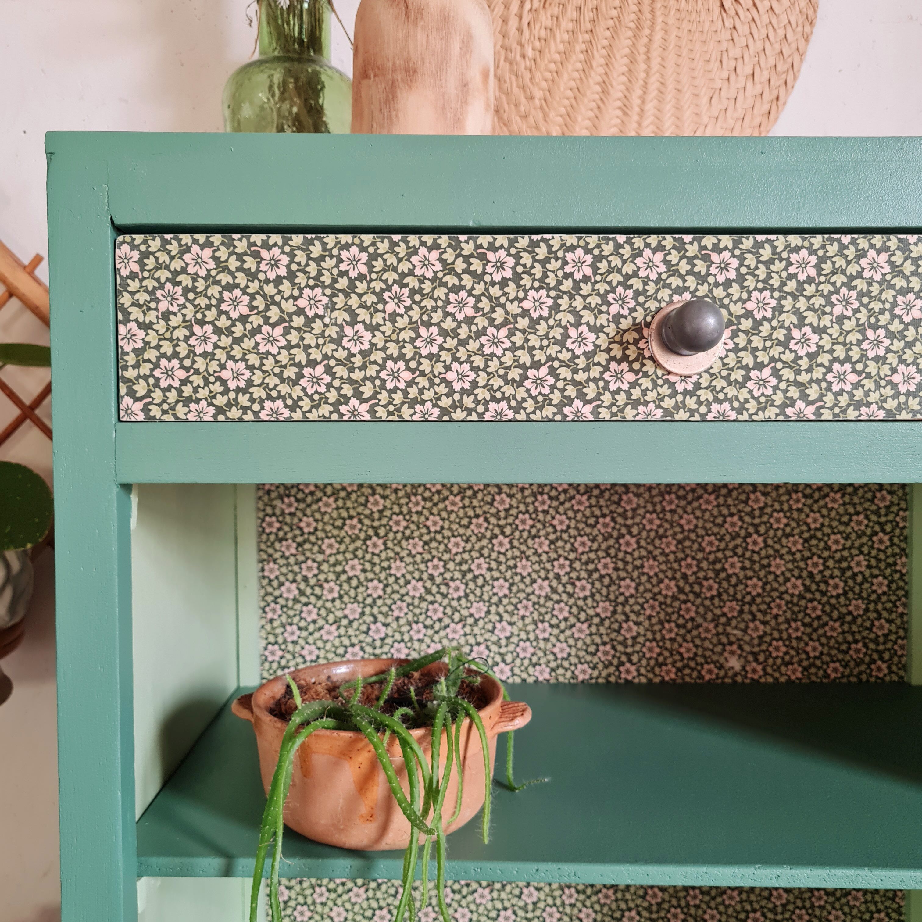 Renovated library shelf green color and floral atmosphere