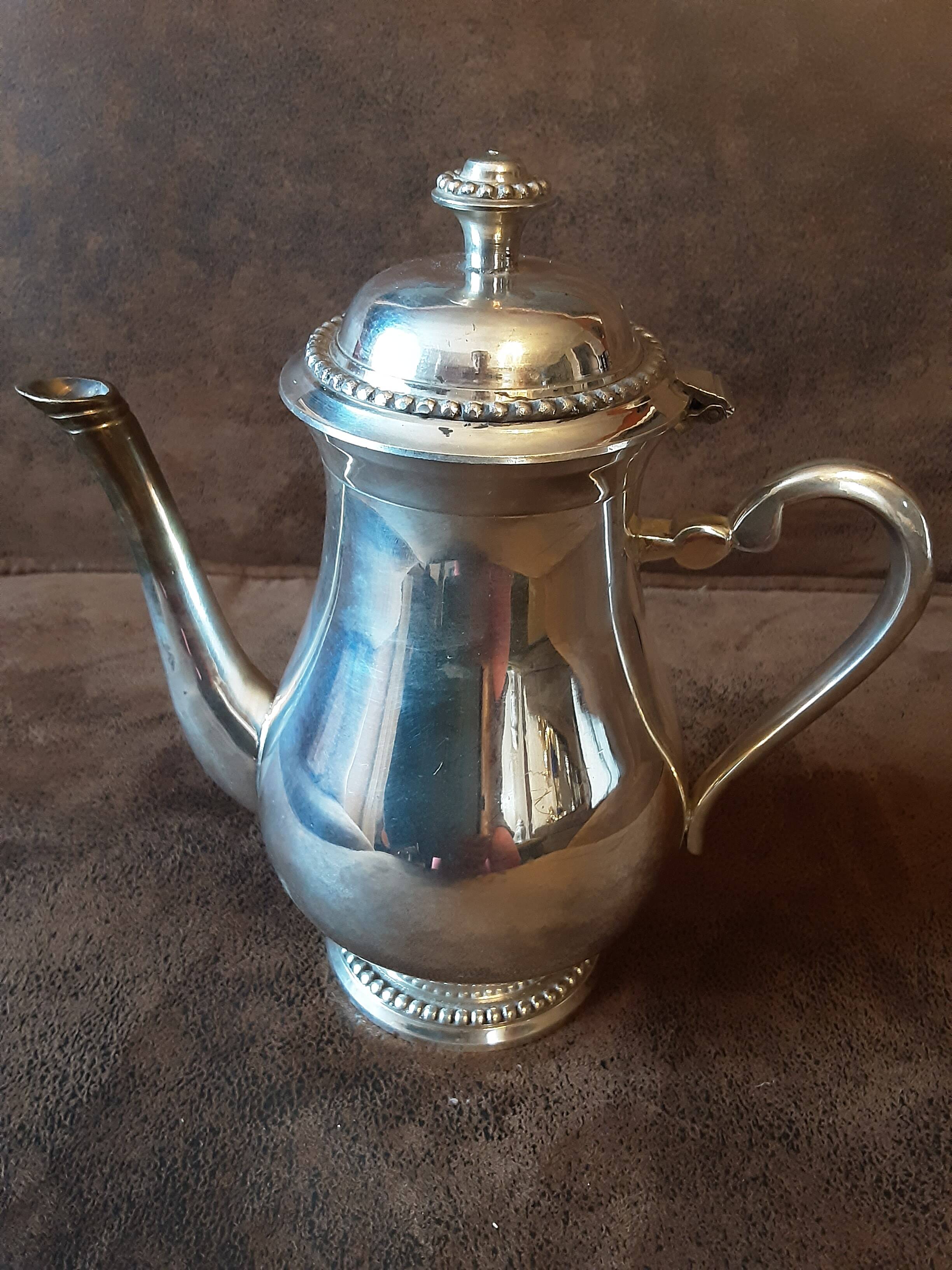 Silver metal teapot