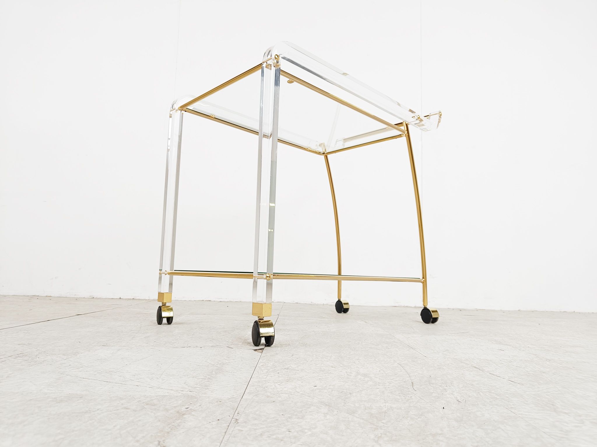 Brass and lucite drinks trolley, 1970s