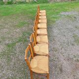 Suite of 9 straw chairs