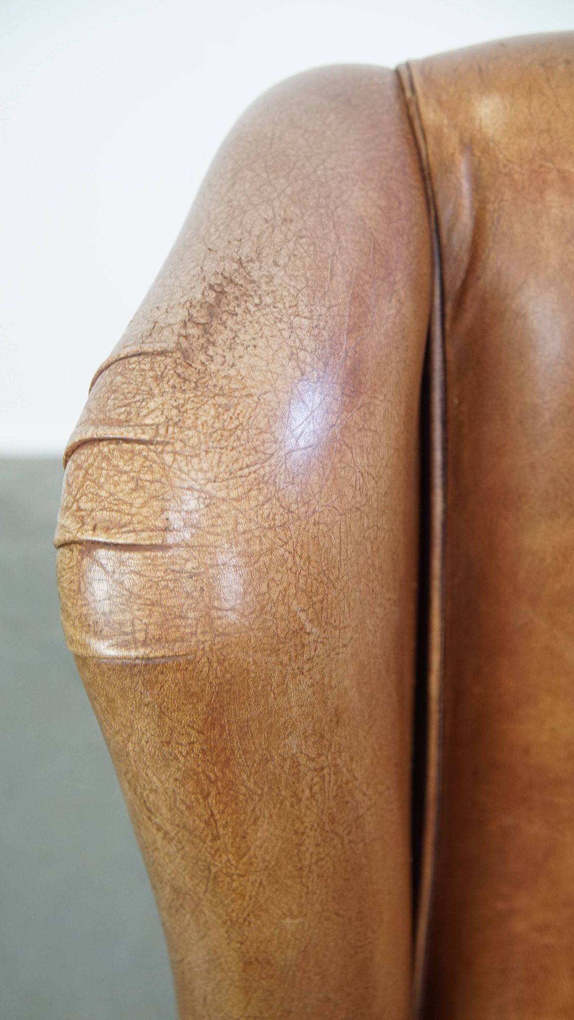 Cowhide Leather Wingback Chair in Light Cognac Color