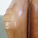 Cowhide Leather Wingback Chair in Light Cognac Color