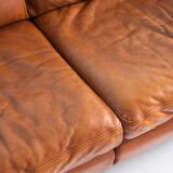 Vintage three-seater leather sofa. Edition by Roche Bobois. France, 70s-80s