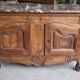 Very Louis XV from the 18th century in walnut with a marble top.
