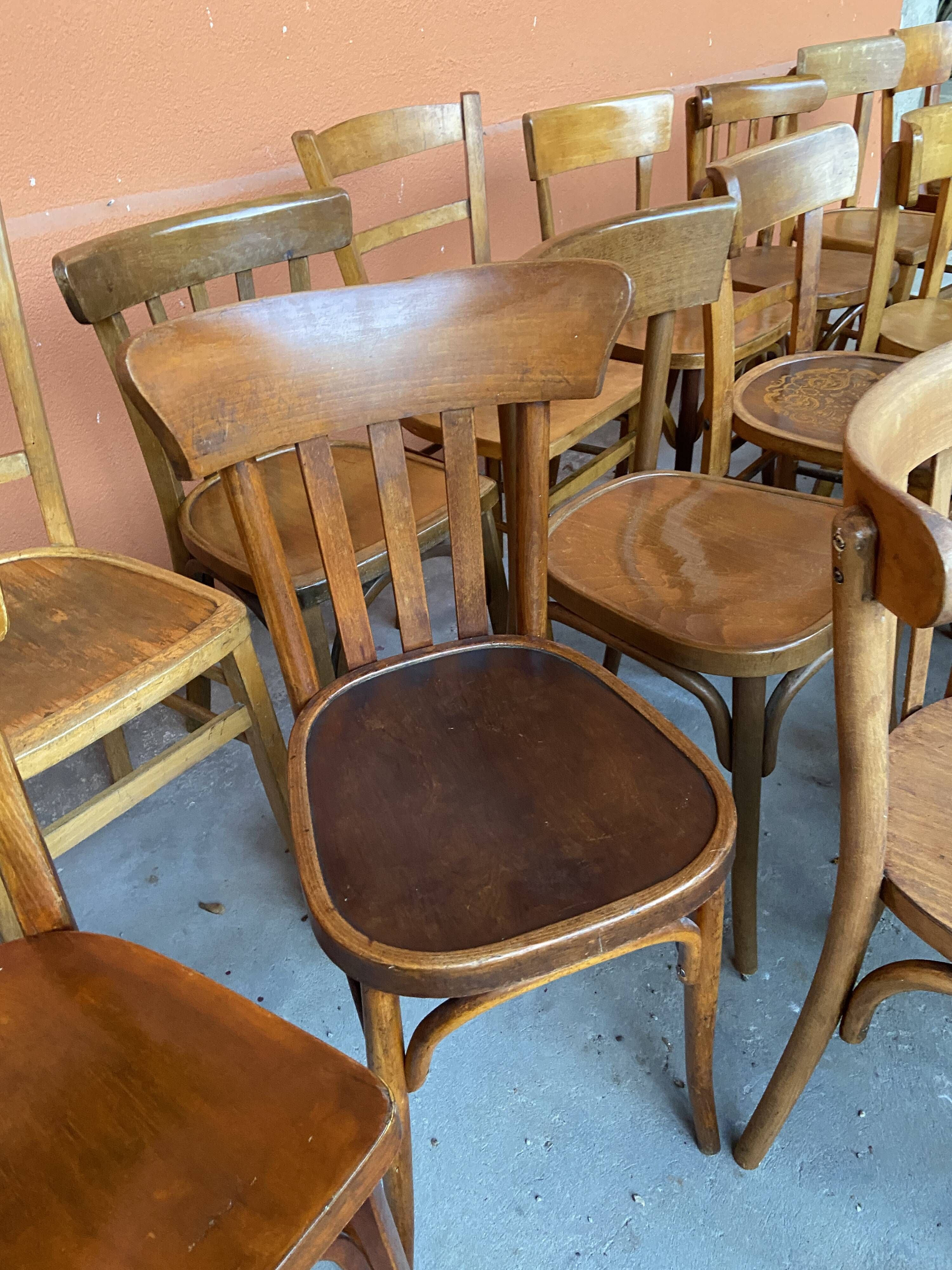 Set of 30 mismatched bistro chairs French Restaurant curved wood