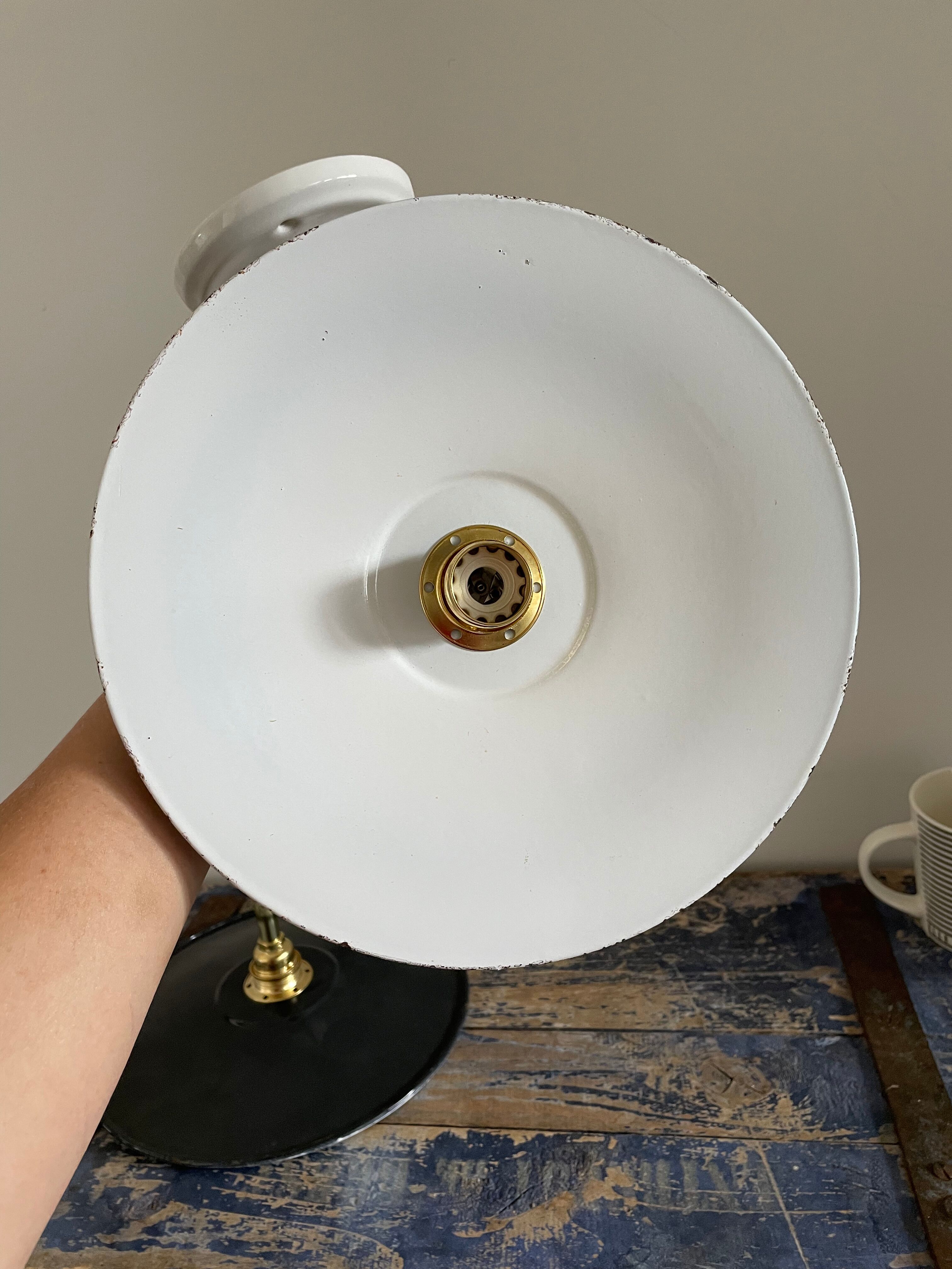 Pair of black enamelled sheet metal wall lamps electrified to nine