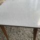 Table de cuisine 1960’s en formica et piétement compas bois
