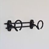 Wrought iron wall coat rack